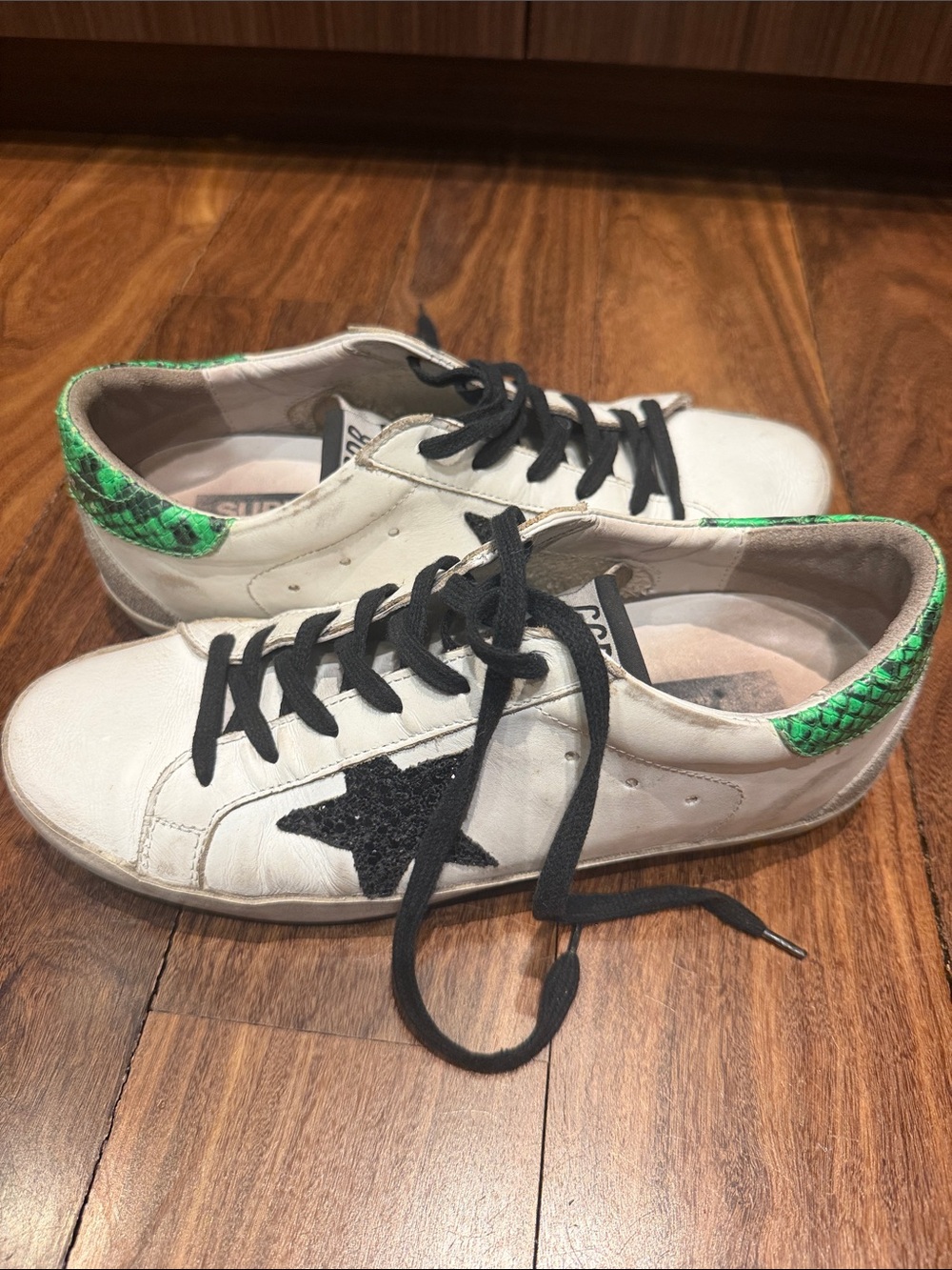 Golden Goose White Sneakers with Black Star and Green Heel Accent